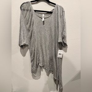 Free People Movement Tunic. NWT. Never worn, size x-s-Small. Runs big, loose fit
